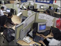 Hewlett-Packard employees work at the company's Business Process Outsourcing centre in Bangalore
