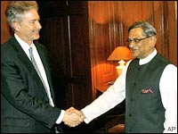 US Under Secretary of State William Burns shakes hands with Indian Foreign Minister S.M. Krishna in New Delhi Wednesday