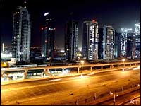 Buildings are illuminated along the Sheikh Zayed road in Dubai